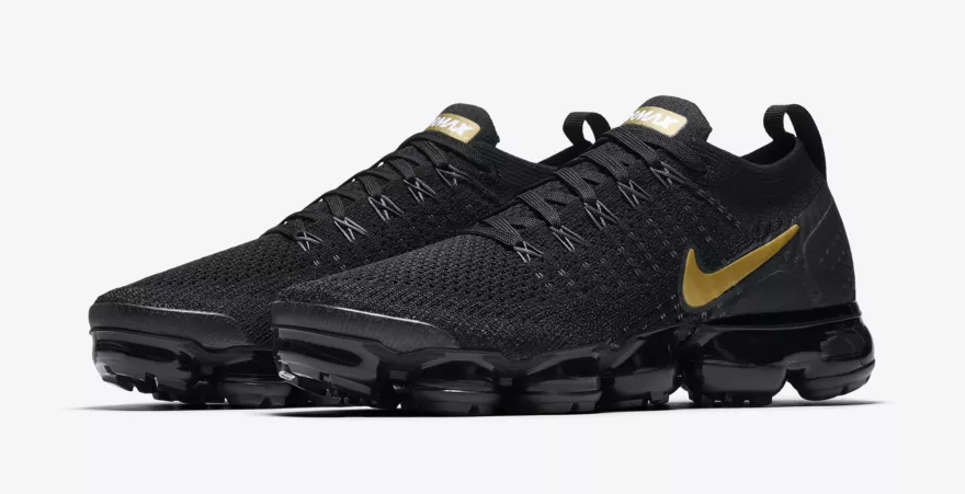 gold and black vapormax